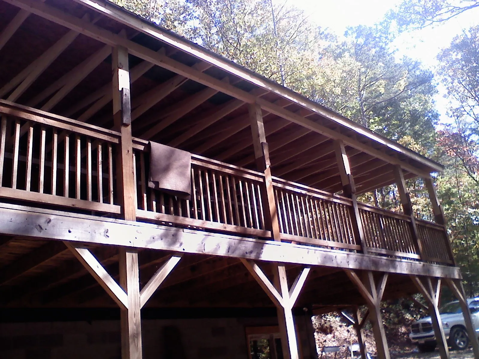 Timber framing under a new elevated porch and deck in La Porte